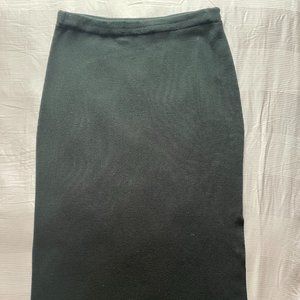 Black full-length Merino wool skirt with slit.
